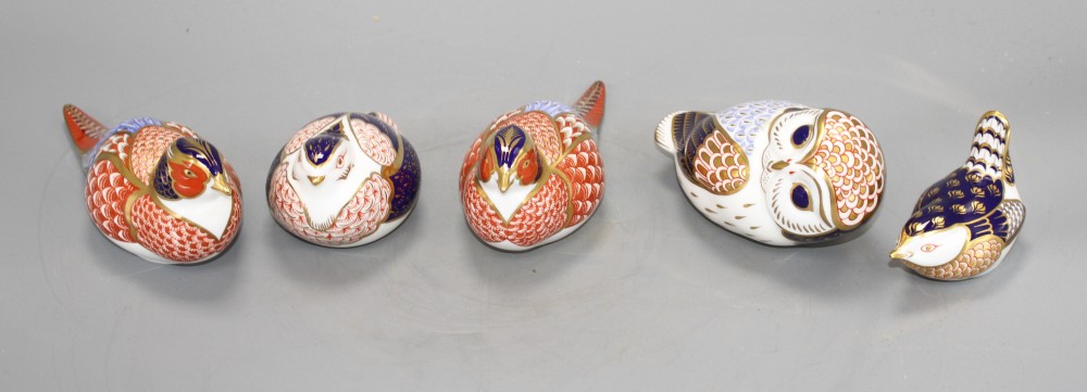 Two Royal Crown Derby pheasant paperweights and three other bird paperweights